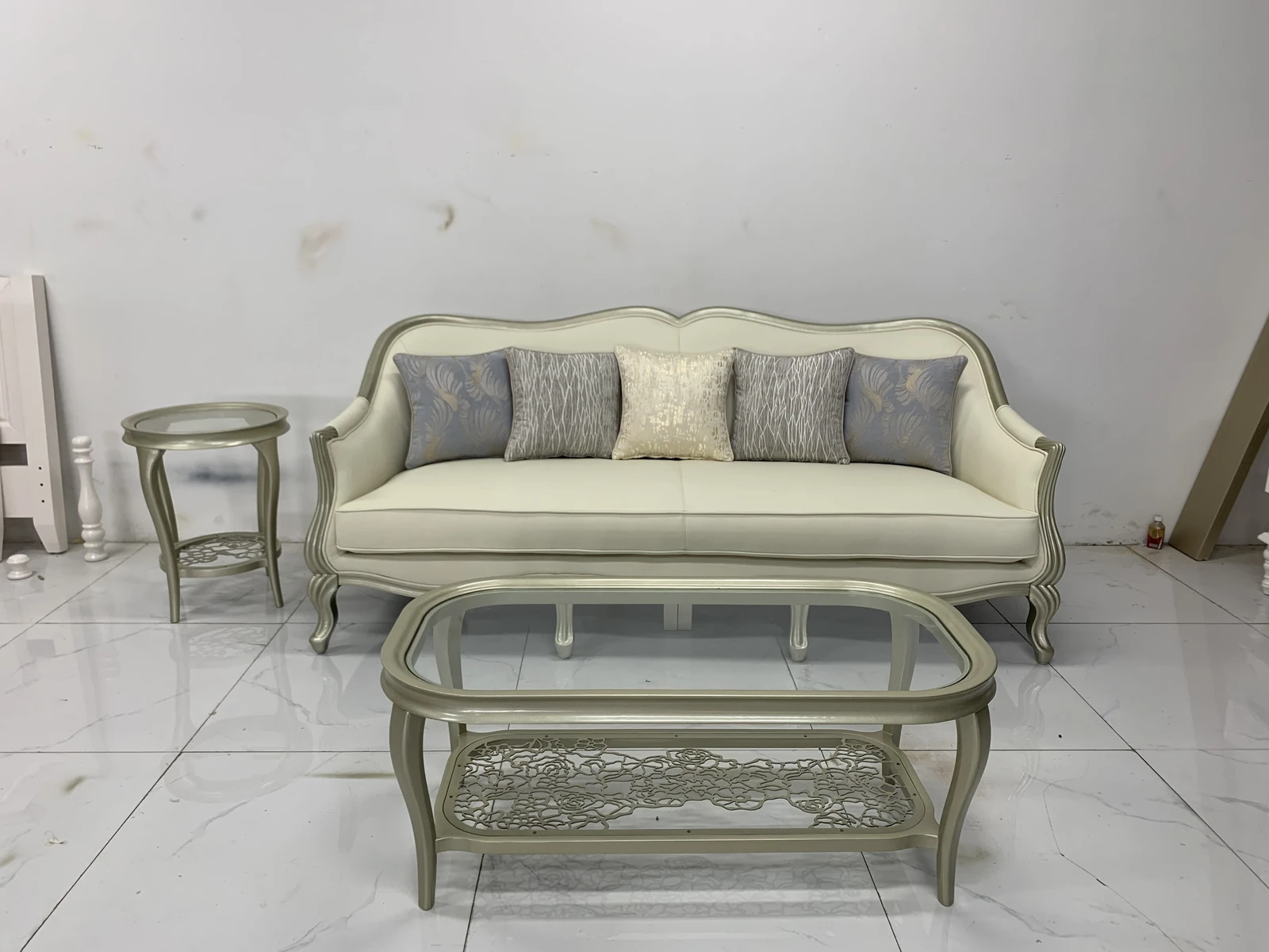 Cream-colored sofa with decorative pillows